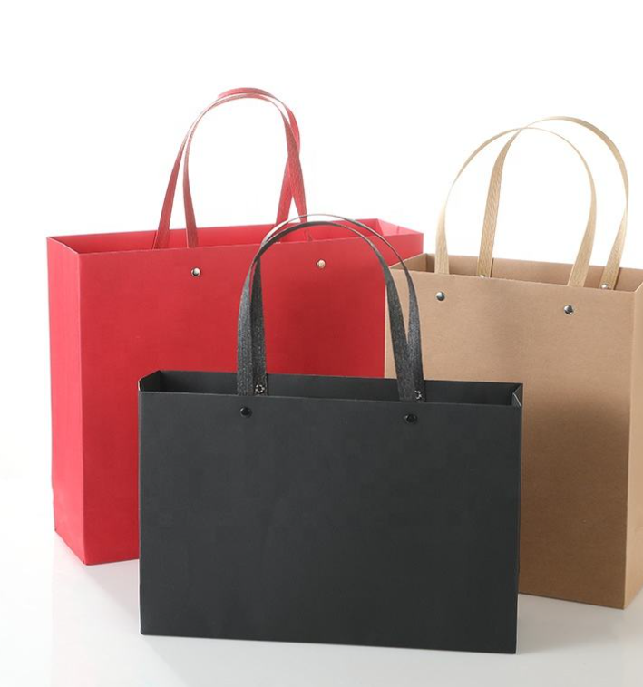 Customized boutique shopping packaging: matte paper gift bags with logo