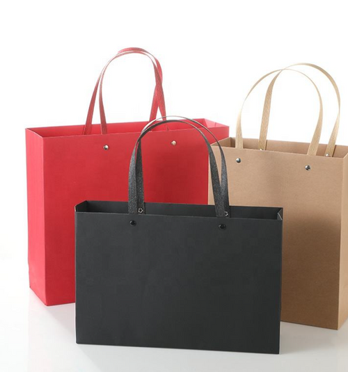 Customized boutique shopping packaging: matte paper gift bags with logo